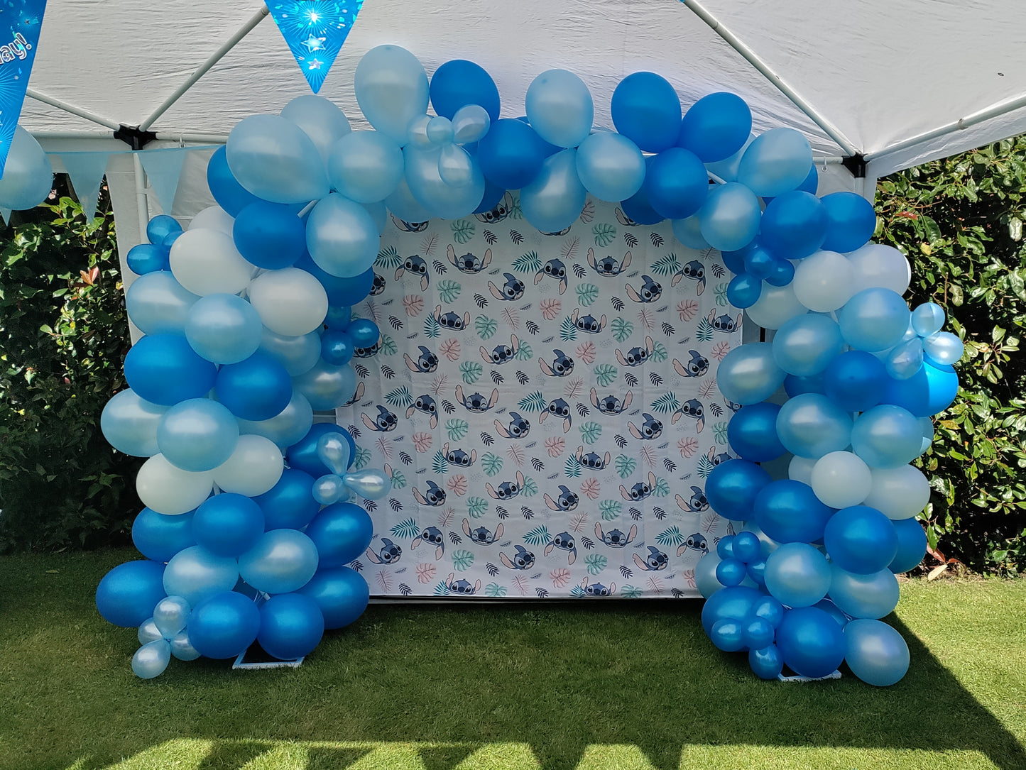 Stitch themed blue balloon arch